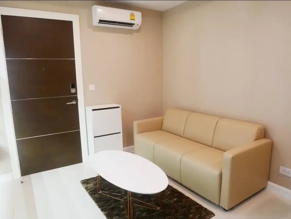 bedroom of The Metropolis Samrong
