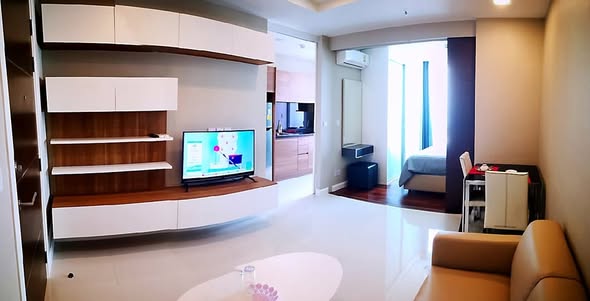 bedroom and living room of The Metropolis Samrong