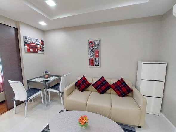 living room and bedroom of The Metropolis Samrong