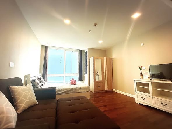 living room and bedroom of The Metropolis Samrong