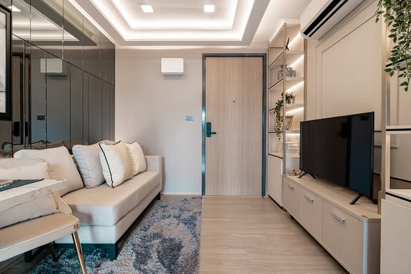 bedroom and living room of The Moment Ratchada 19