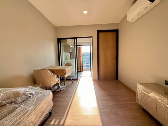 bedroom and room interior of The Moment Ratchada 19