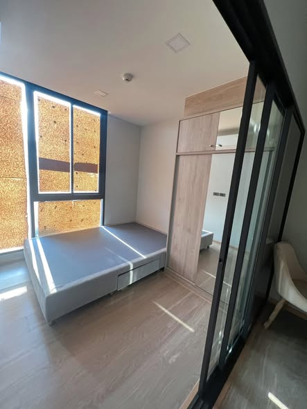bedroom and room interior of The Moment Ratchada 19