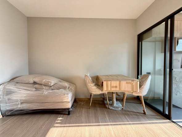 bedroom and room interior of The Moment Ratchada 19