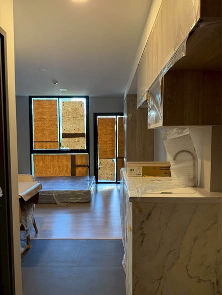 room interior and bathroom of The Moment Ratchada 19