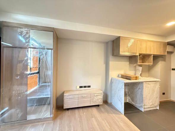room interior and kitchen of The Moment Ratchada 19