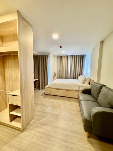 bedroom and room interior of THE MUVE Sukhumvit 107