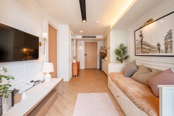 bedroom and living room of The Nest Ploenchit