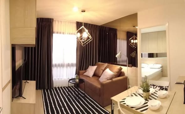 living room and bedroom of The Nest Sukhumvit 22