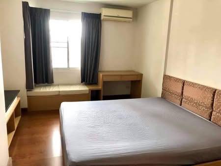 bedroom of The Next Garden Suites
