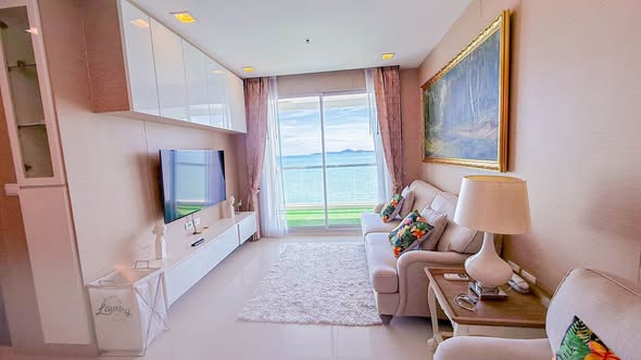 bedroom and living room of The Palm Wongamat Beach Pattaya