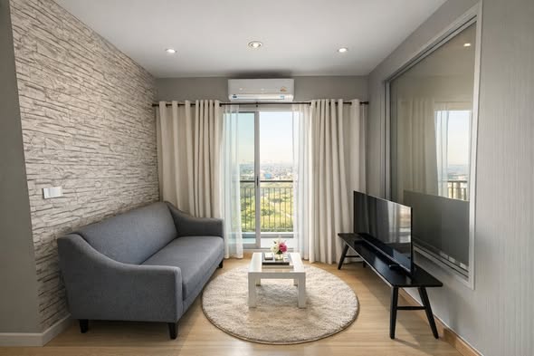 bedroom and living room of The Parkland Srinakarin Lakeside