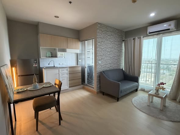 living room and bedroom of The Parkland Srinakarin Lakeside