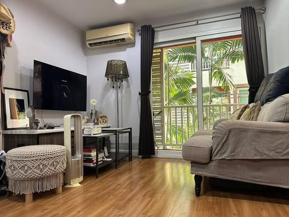 living room and bedroom of The Plenary Sathon