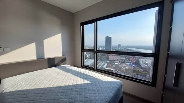 bedroom of The Politan Aqua