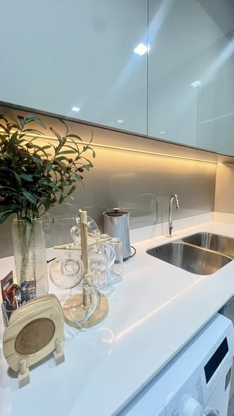 bathroom and kitchen of The Politan Rive