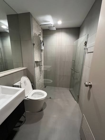 room interior and bathroom of The Politan Rive