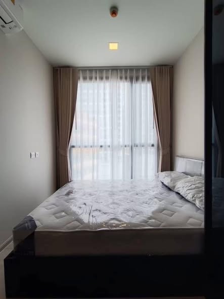 bedroom of The Privacy Jatujak