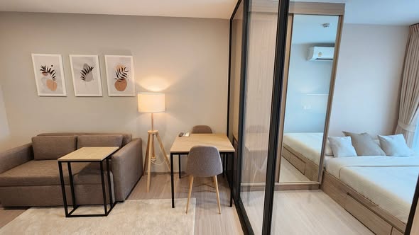 bedroom and living room of The Privacy S101