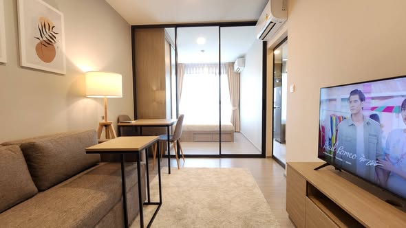 living room and bedroom of The Privacy S101