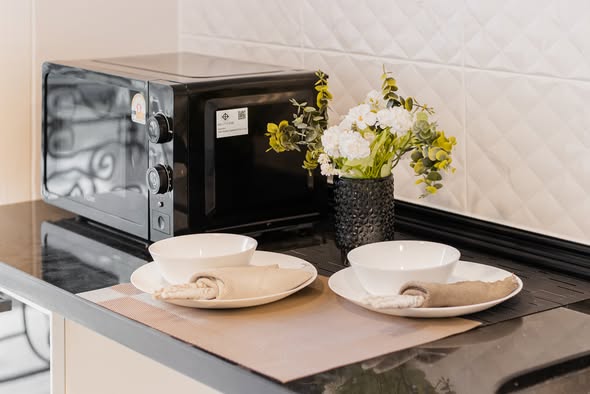 bathroom and kitchen of The Raffles Condominium
