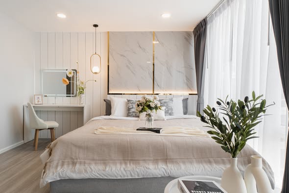 bedroom of The Raffles Condominium
