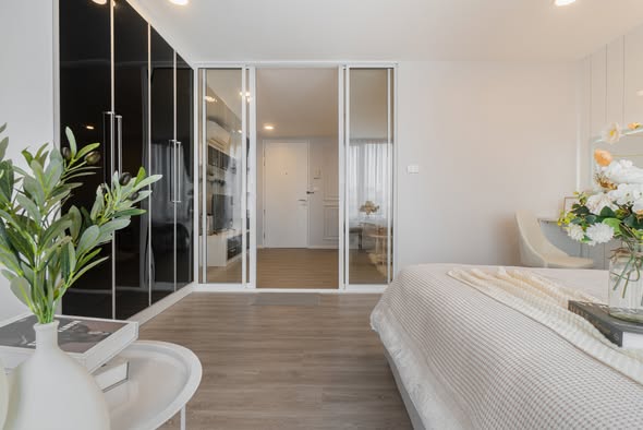 bedroom of The Raffles Condominium