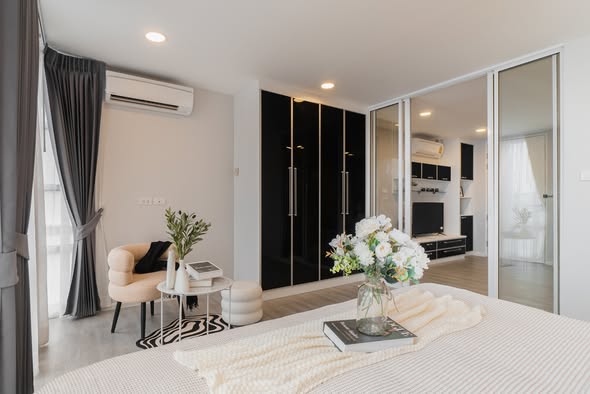 bedroom and room interior of The Raffles Condominium