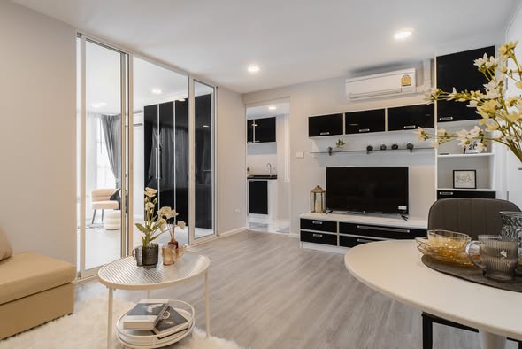 living room of The Raffles Condominium