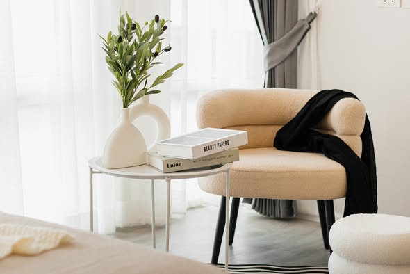 living room and bedroom of The Raffles Condominium