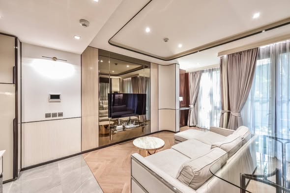 bedroom and living room of The Reserve Sukhumvit 61