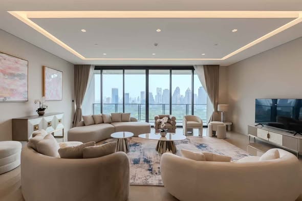 bedroom and living room of The Residences at Sindhorn Kempinski Hotel Bangkok