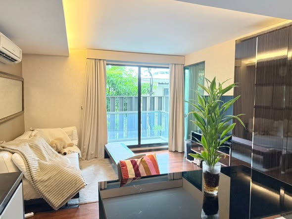 living room and bedroom of The Rise Sukhumvit 39