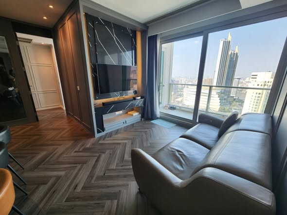 bedroom and living room of The River Condominium