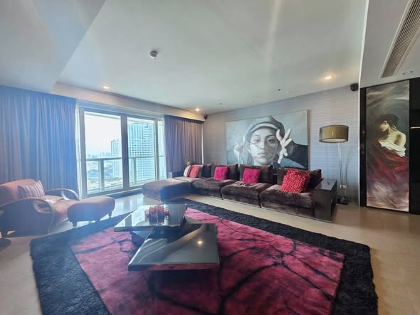 bedroom and living room of The River Condominium