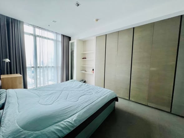 bedroom and room interior of The River Condominium