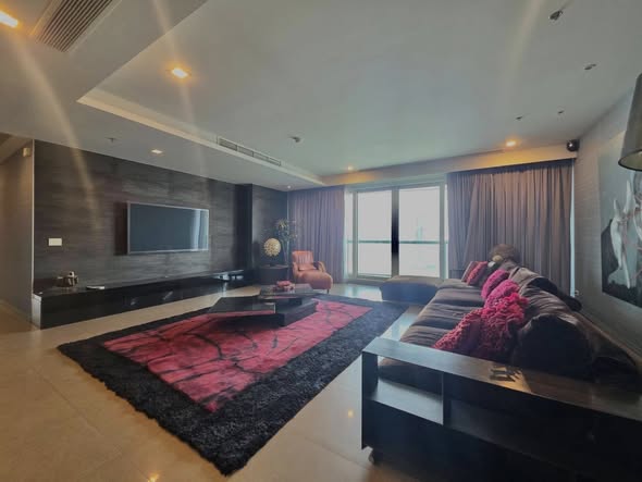 living room and bedroom of The River Condominium