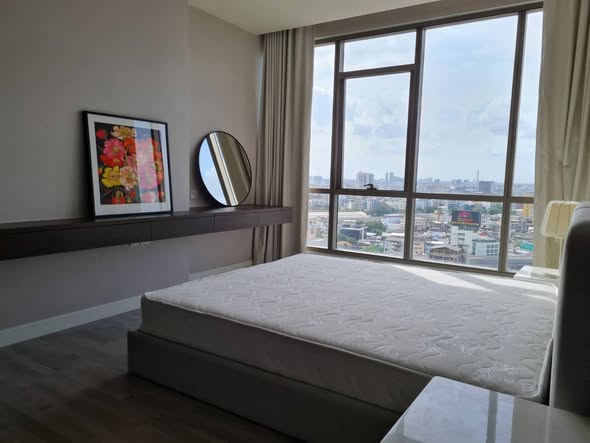 bedroom and living room of The Room Rama 4