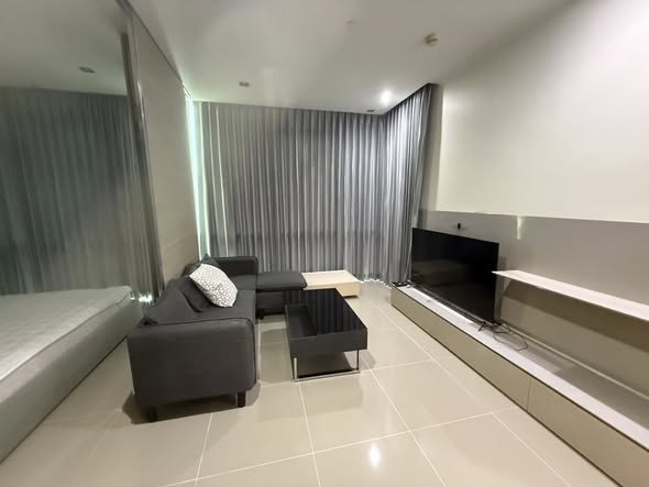 bedroom and living room of The Room Sukhumvit 21