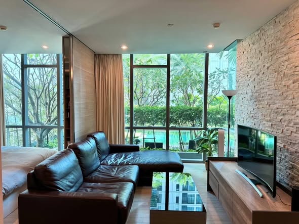 bedroom and living room and room interior of The Room Sukhumvit 21
