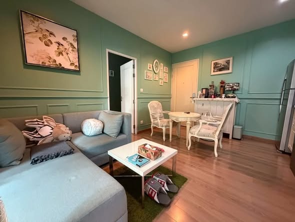 bedroom and living room of The Seed Memory Siam