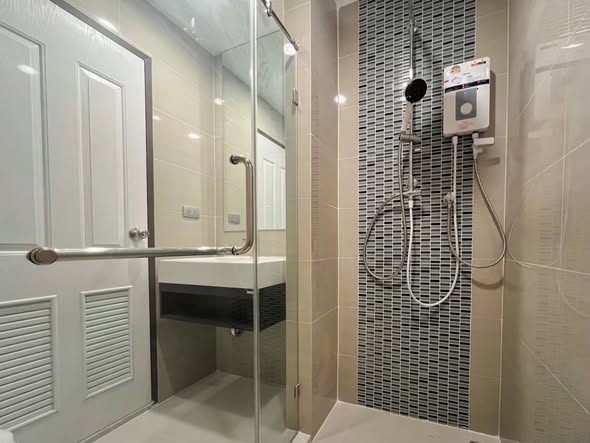 room interior and bathroom of The Sky Sukhumvit