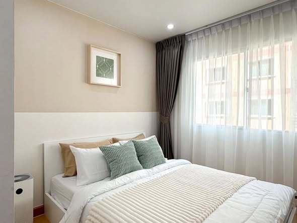bedroom of The Smart Condo