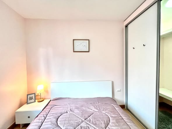 bedroom of The Smart Condo