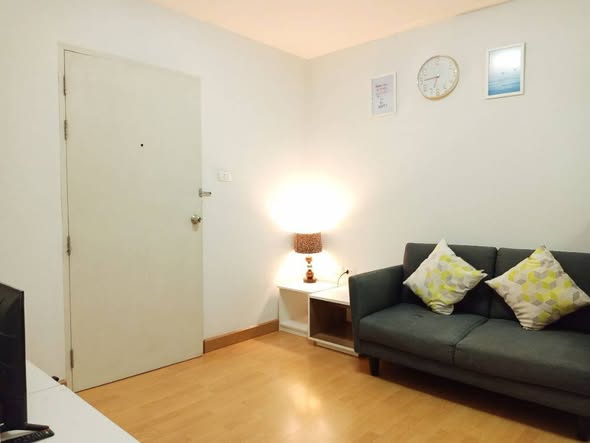 bedroom and living room of The Smart Condo