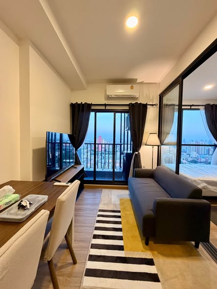 living room and bedroom of The Stage Mindscape Ratchada-Huai Khwang