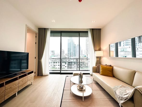 bedroom and living room of The Strand Thonglor