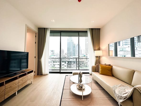 bedroom and living room of The Strand Thonglor
