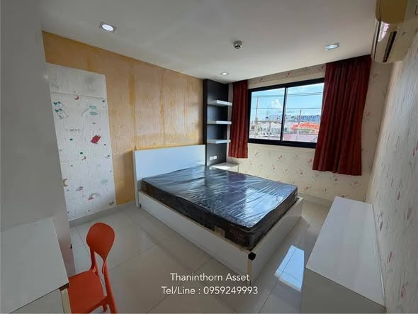 bedroom of The Time Condominium