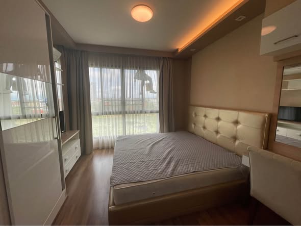 bedroom of The Treasure Condominium by My Hip